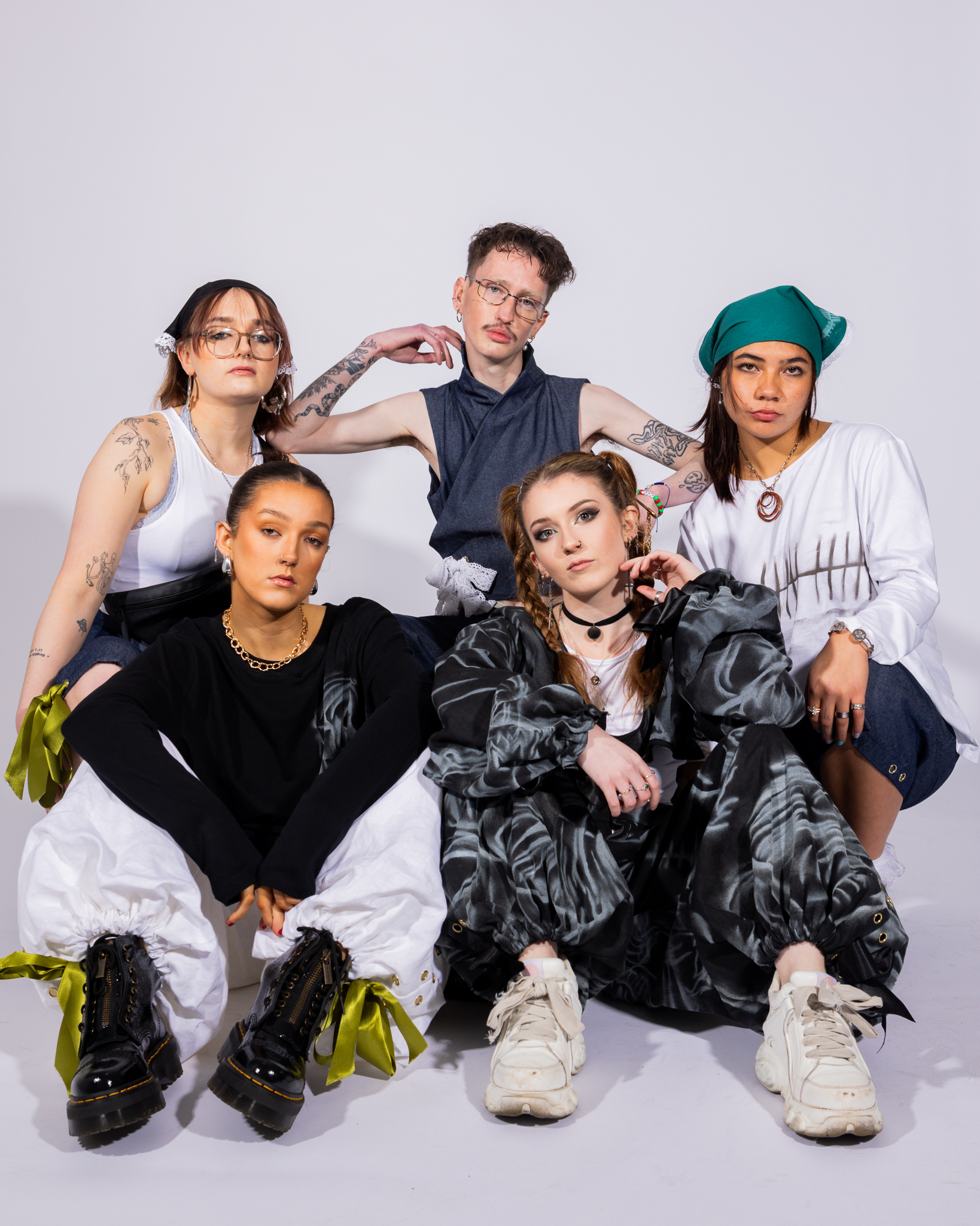 Five models wearing Sperrin Design pieces from the FW25 collection